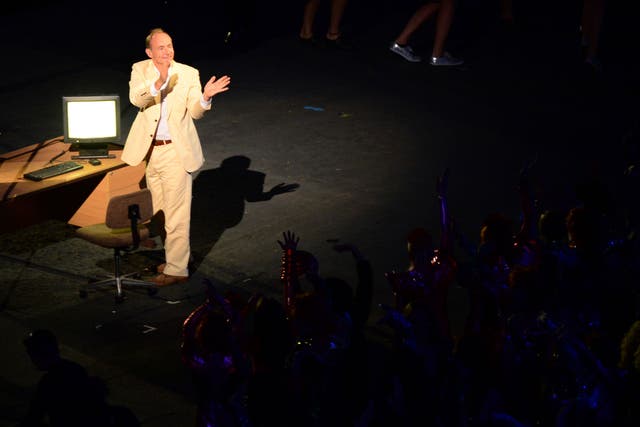The British scientist who invented the World Wide Web, Sir Tim Berners-Lee, waves as he in introduced to the audience during the opening ceremony of the London 2012 Olympic Games