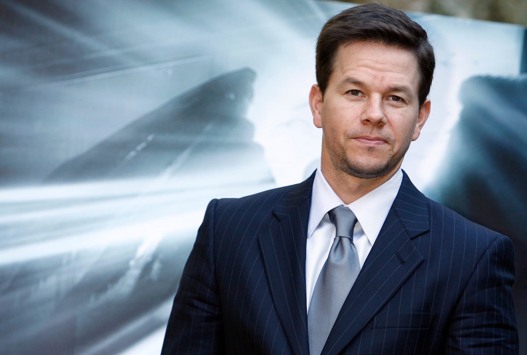 Actor Mark Wahlberg was desperate to win the producing rights for 'Fifty Shades Of Grey'