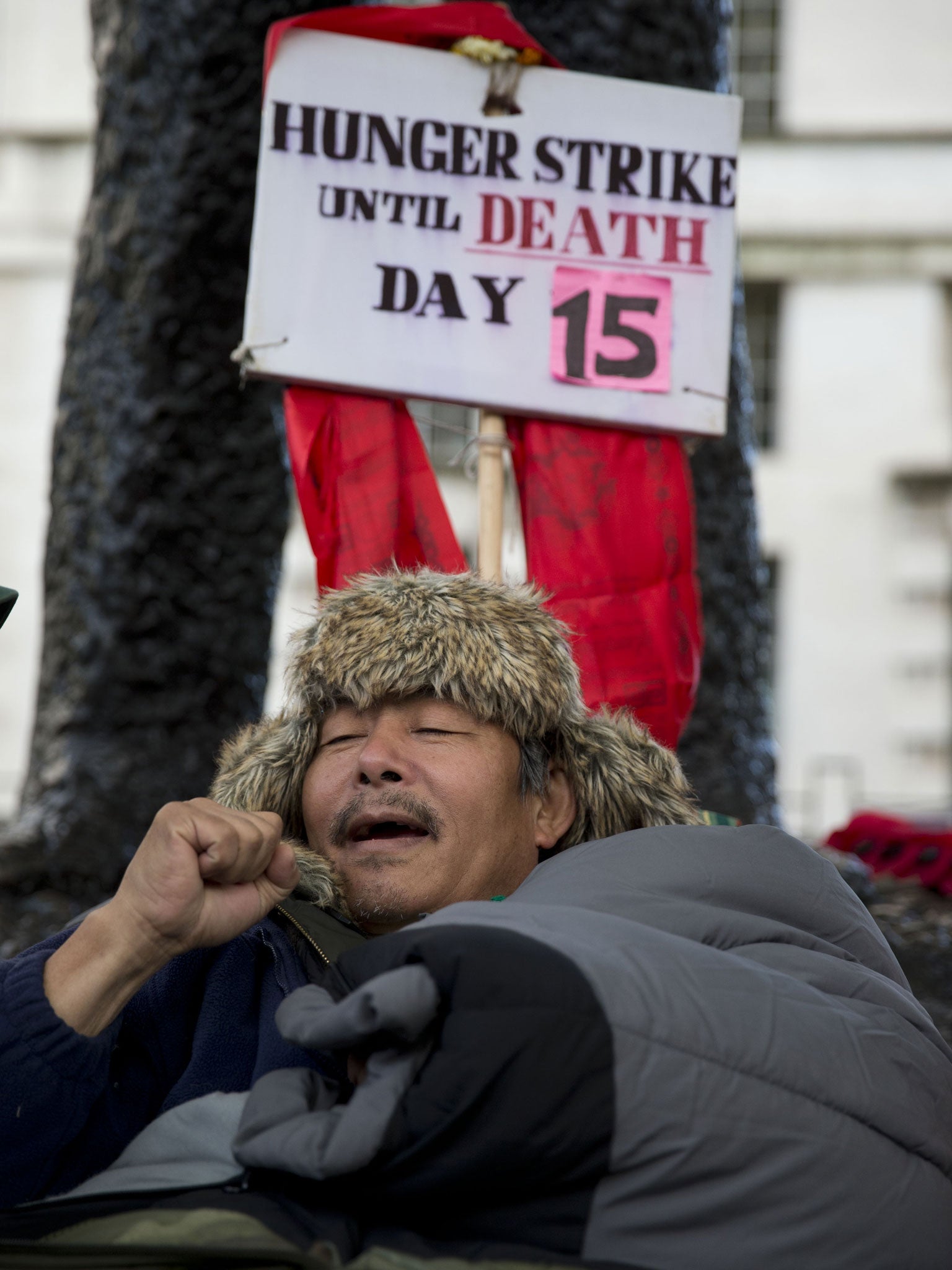 Gyanraj Rai, aged 55, a retired Gurkha warrant officer from the British military takes part in the 15th-day of his hunger strike opposite the entrance to Downing Street in London, Thursday