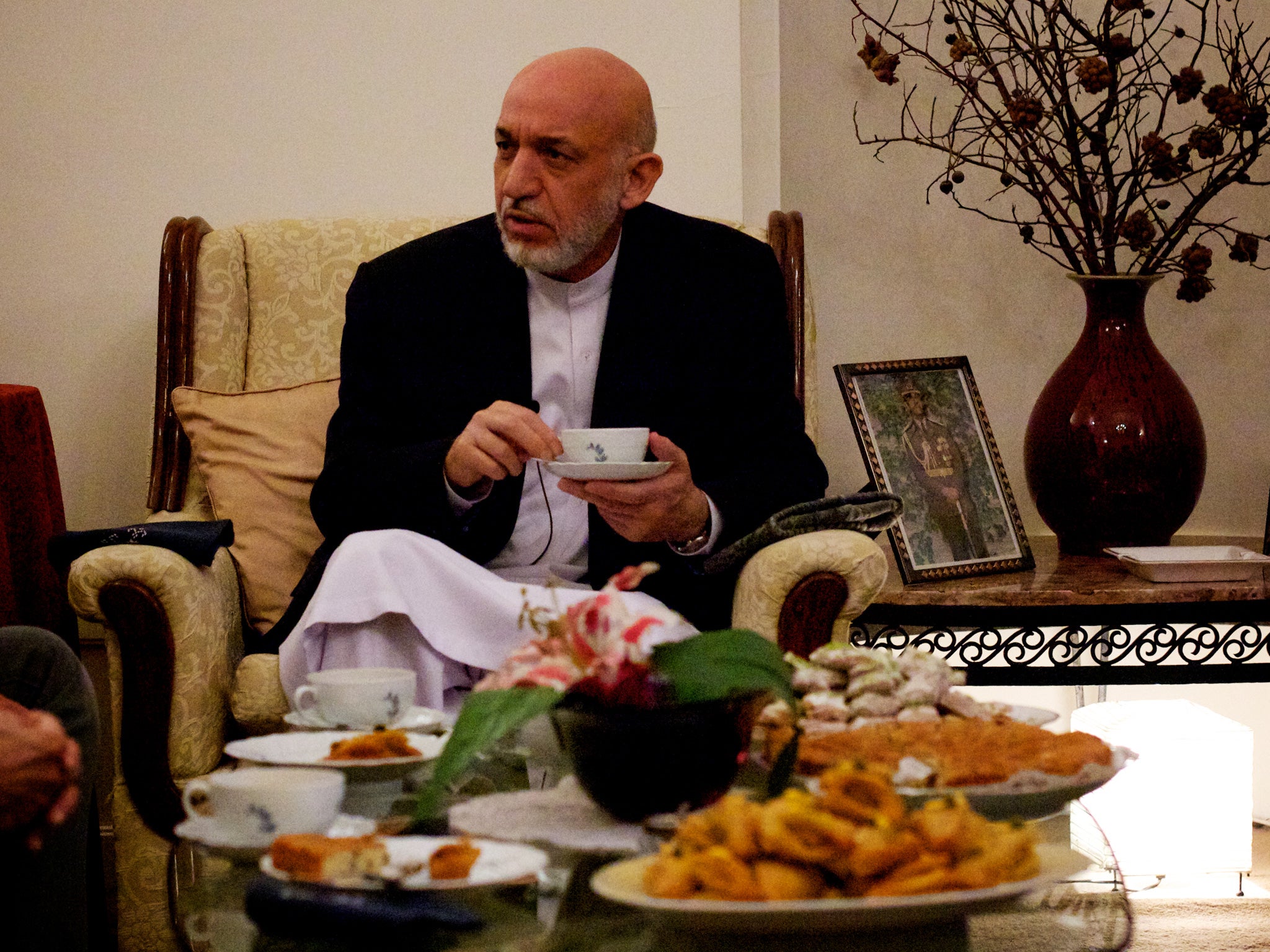 Karzai drinking tea in his private apartment. The President is said to be a huge fan of the ‘English country style’ of interiors