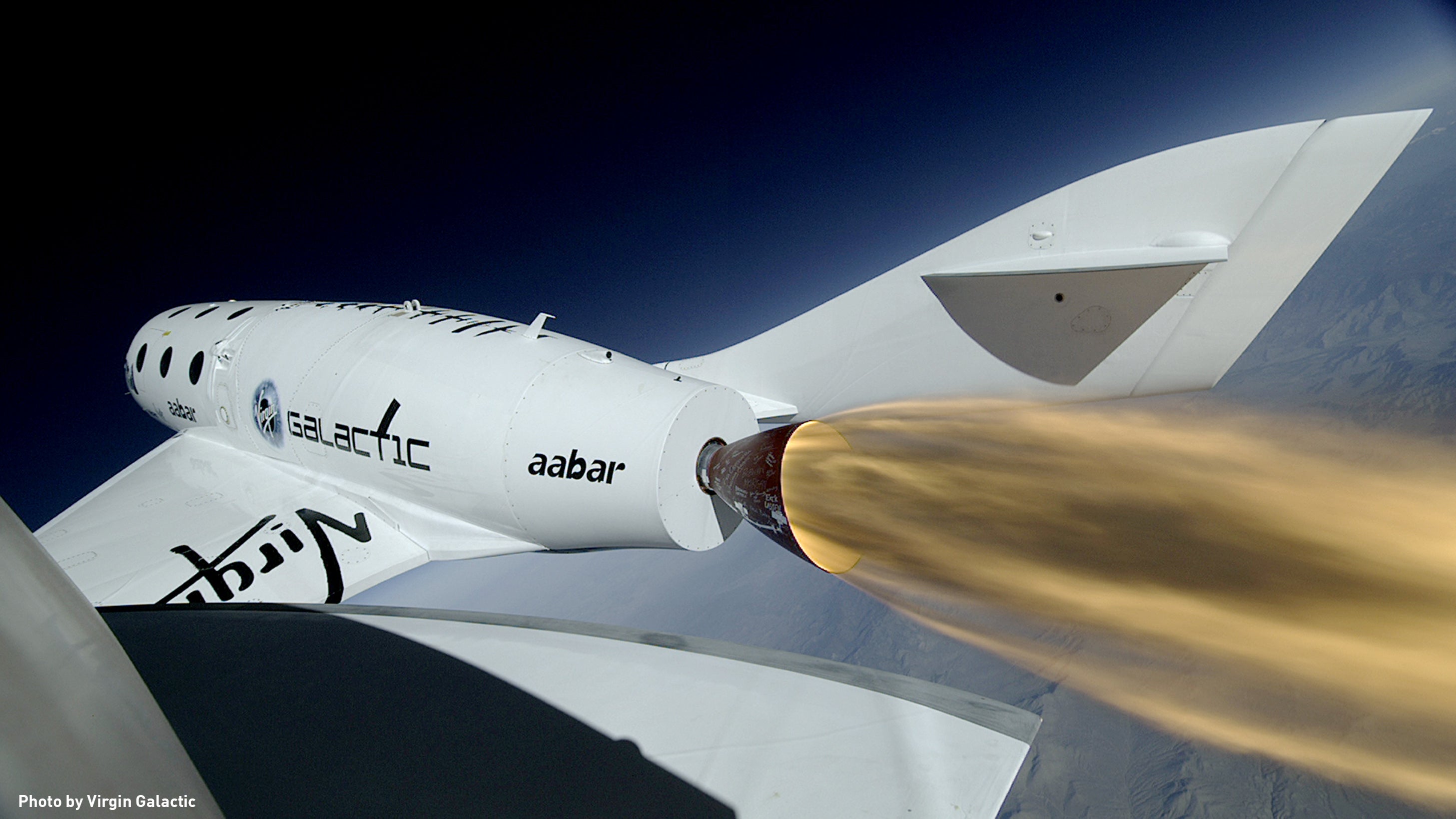 The Virgin Spaceship Enterprise is seen breaking the speed of sound in April 2013.