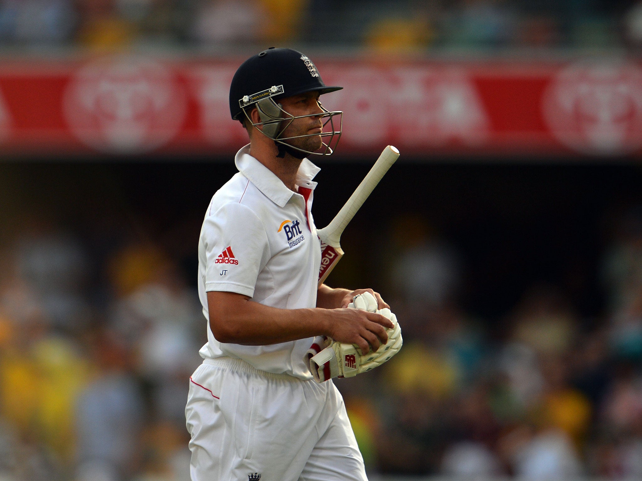England's batsman Jonathan Trott leaves the ground following his dismissal