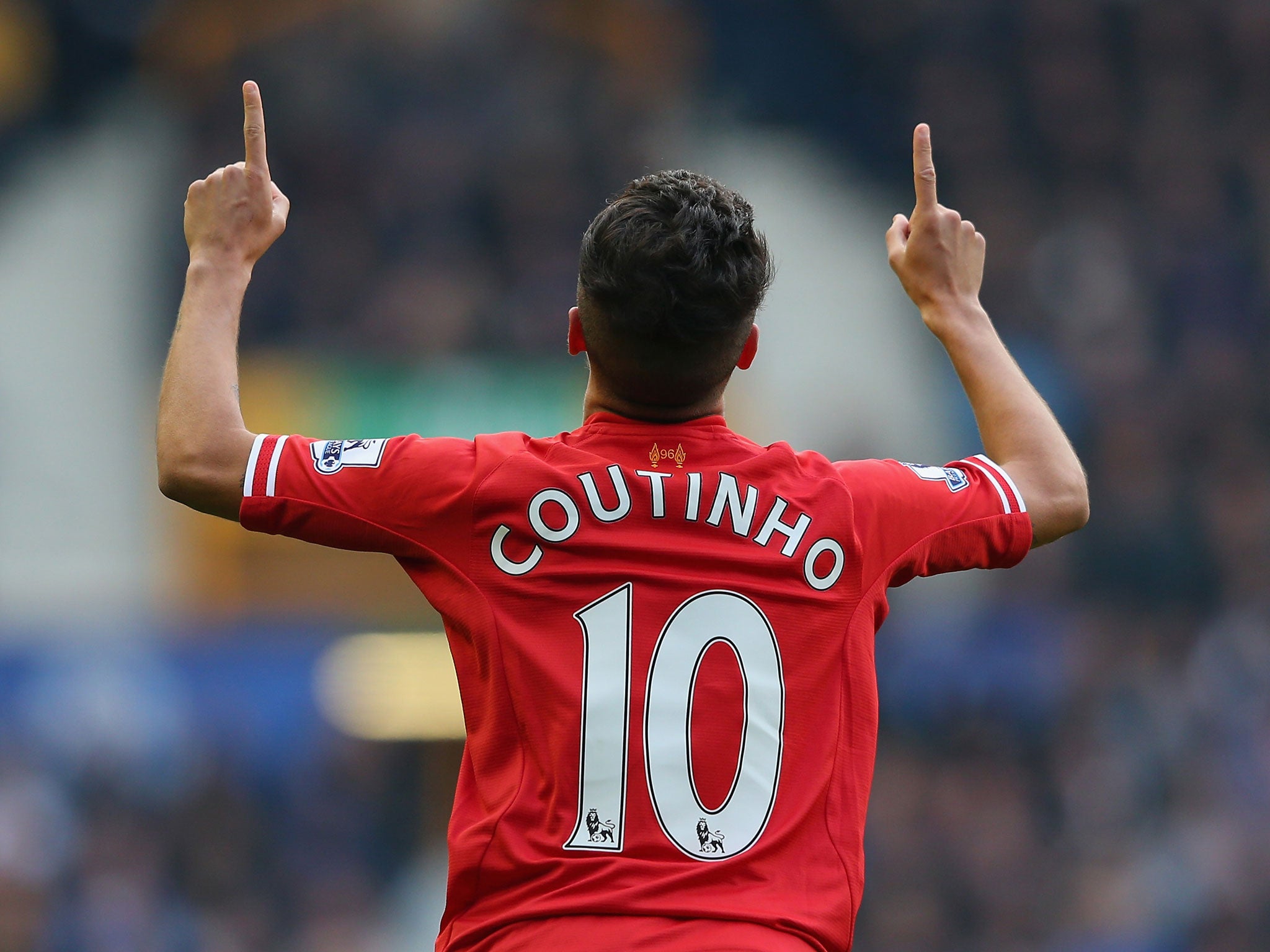 Coutinho of Liverpool celebrates scoring the opening goal