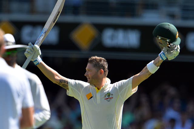 Australia's batsman Michael Clarke celebrates his 100 runs
