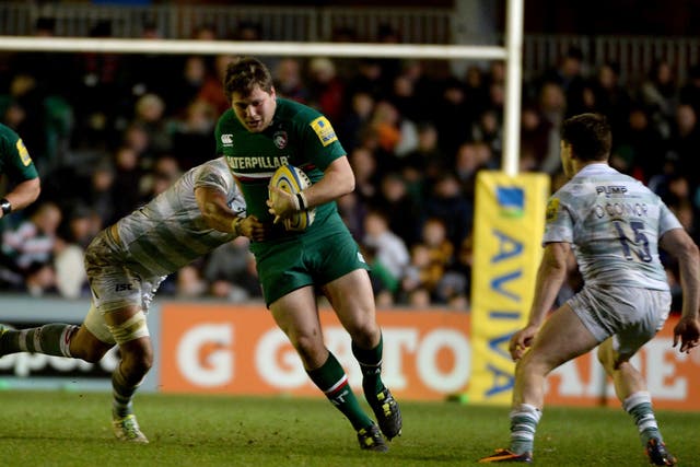 Tom Bristow of Leicester Tiger bursts through the London Irish defence