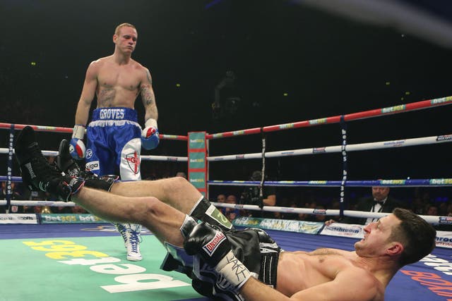 George Groves puts Carl Froch on the canvas during their super-middleweight title fight