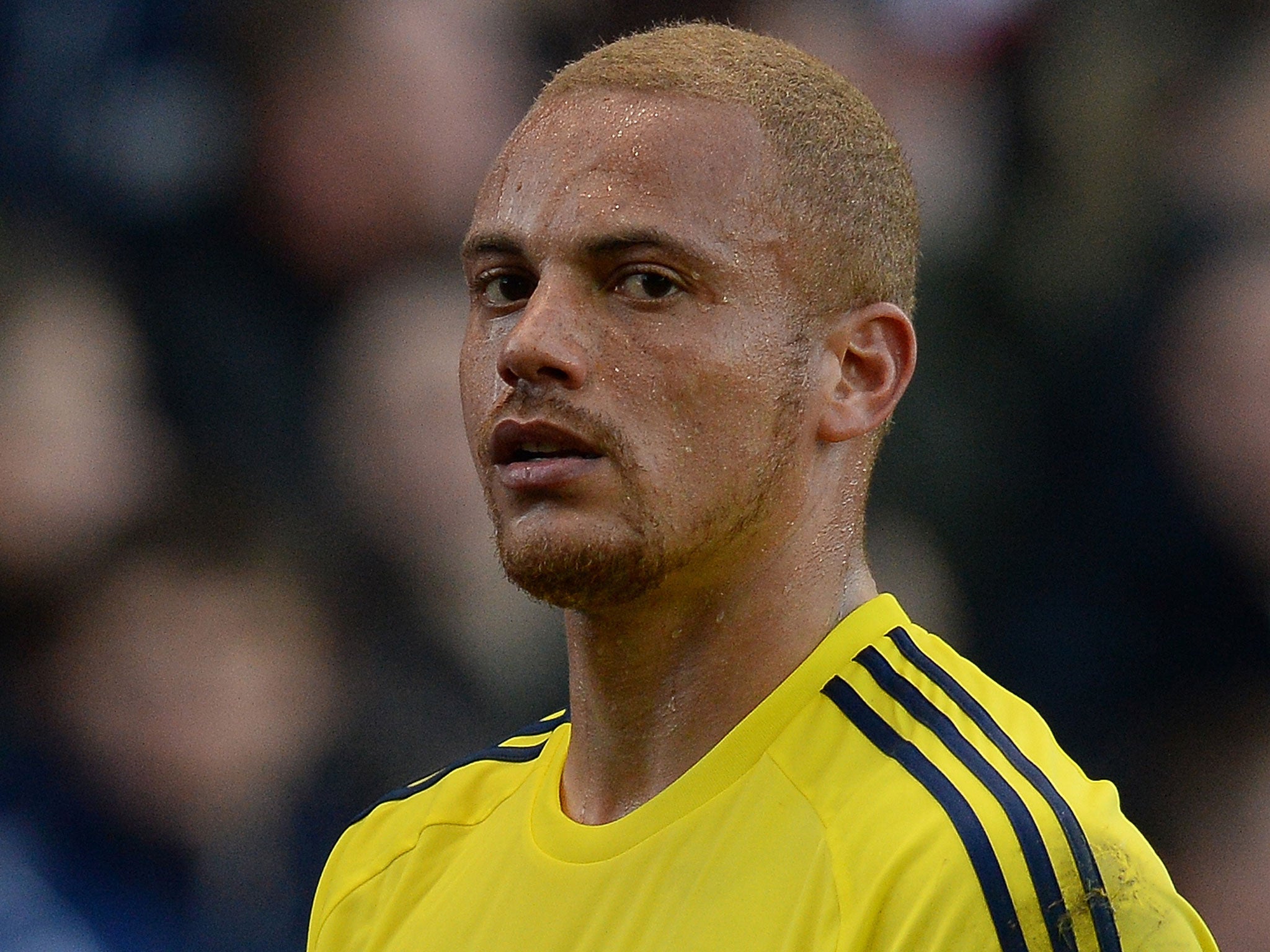 Sunderland defender Wes Brown walks off at the Brittania Stadium after being sent-off in the defeat to Stoke