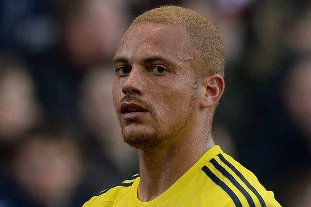Sunderland defender Wes Brown walks off at the Brittania Stadium after being sent-off in the defeat to Stoke