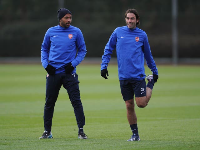Thierry Henry and Robert Pires are both training with Arsenal but Arsene Wenger insists he won't be making a move to bring them back to the club