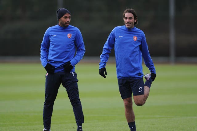 Thierry Henry and Robert Pires are both training with Arsenal but Arsene Wenger insists he won't be making a move to bring them back to the club