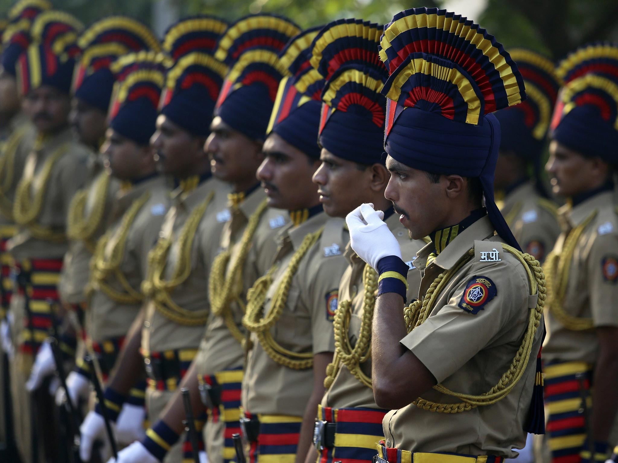 Indian police personnel pay tribute at the memorial built in memory of victims killed in Mumbai terror attacks on the fifth anniversary, in Mumbai, India