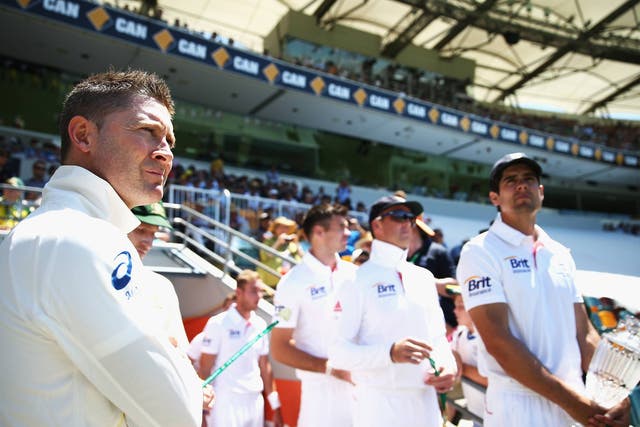 Michael Clarke of Australia and Alastair Cook of England look on before day one of the First Ashes Test 