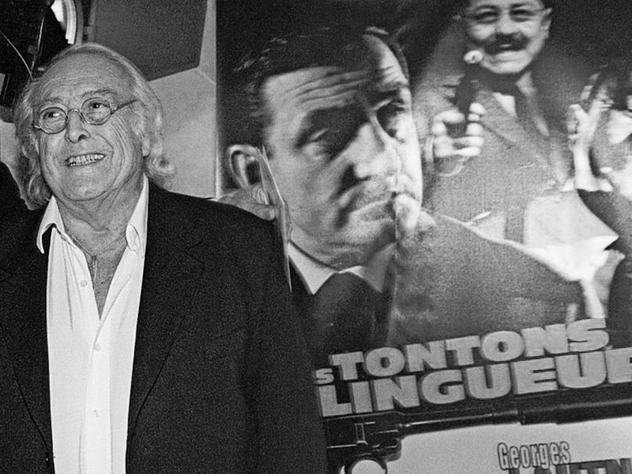 Lautner in Paris in 2002 in front of a poster of his best-known film