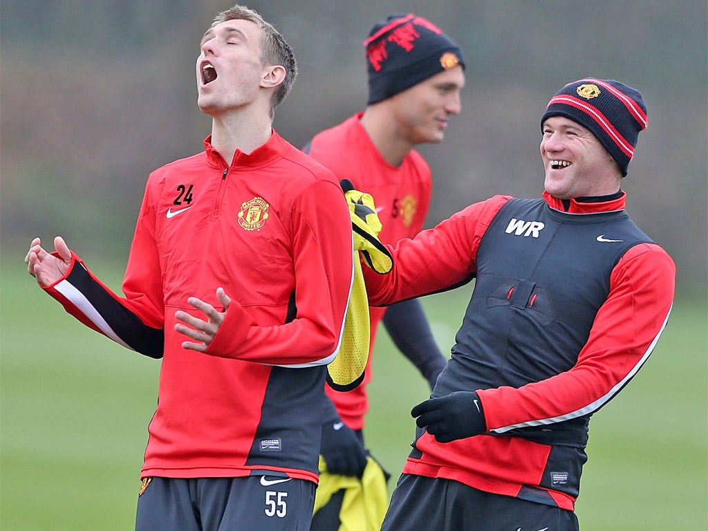 Wayne Rooney (right) and Darren Fletcher during a United training session