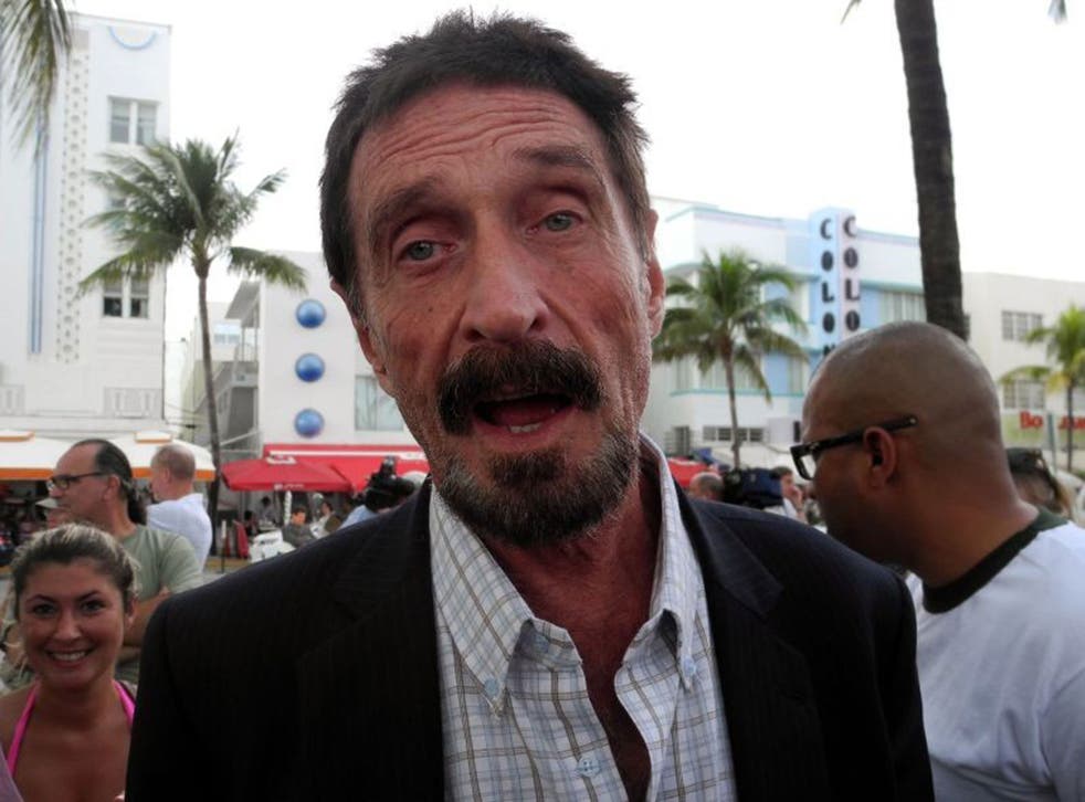 Software company founder John McAfee talks to AFP in front of this hotel in Miami Beach, Florida