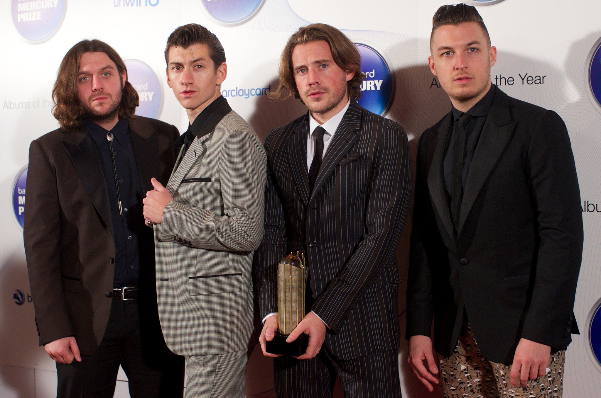 Arctic Monkeys pose with their Albums of the Year trophy at the 2013 Mercury Prize