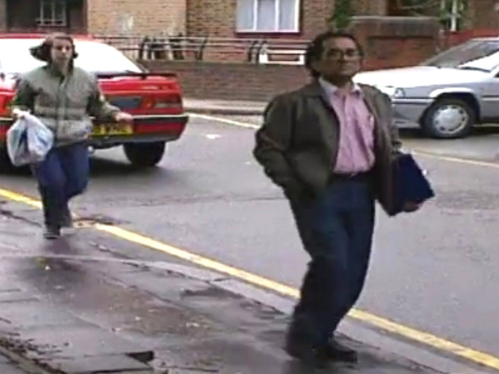 A still from a 1997 ITV documentary shows Aravindan Balakrishnan (right) arriving at an inquest