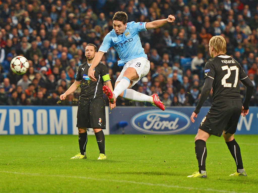 Samir Nasri fires a volley to score City's second against Viktoria Plzen on Wednesday