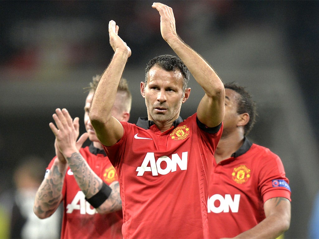 Ryan Giggs applauds the Manchester United away fans on Wednesday