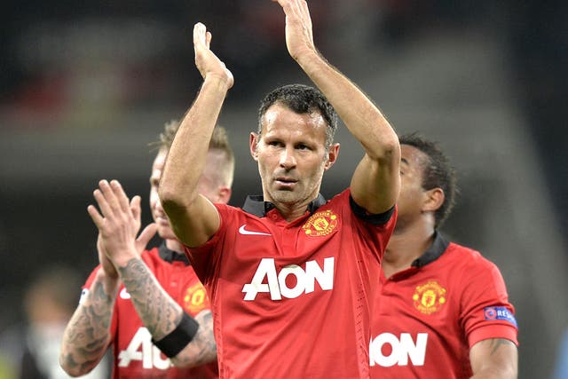 Ryan Giggs applauds the Manchester United away fans