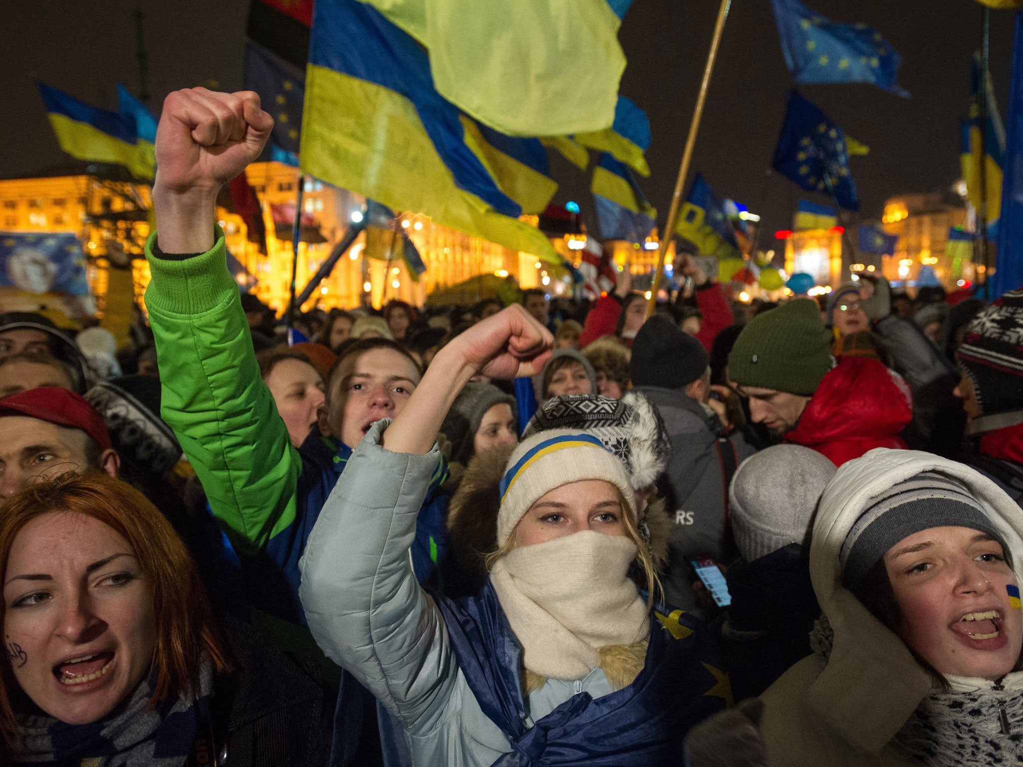 Ukrainians protest in Independence Square in Kiev to demand President Yanukovych signs the deal with the EU