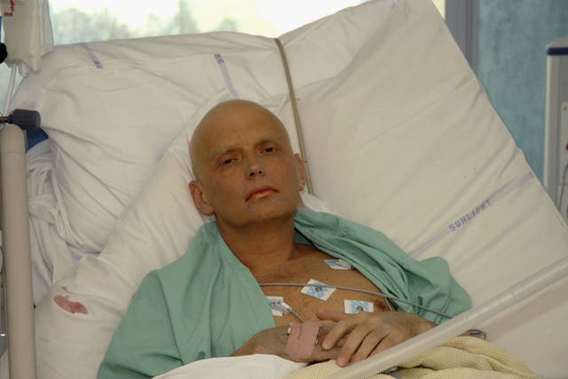 Alexander Litvinenko is pictured at the Intensive Care Unit of University College Hospital in 2006 - secret services allegedly asked the late spy to provide 'expert analysis' on a confidential Foreign Office report