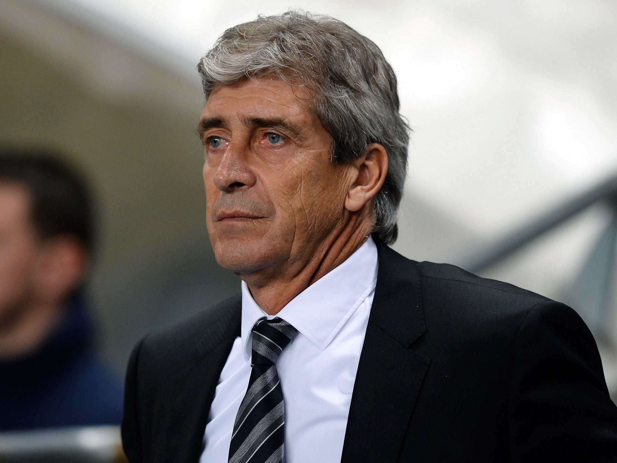 Manuel Pellegrini looks on from the sidelines