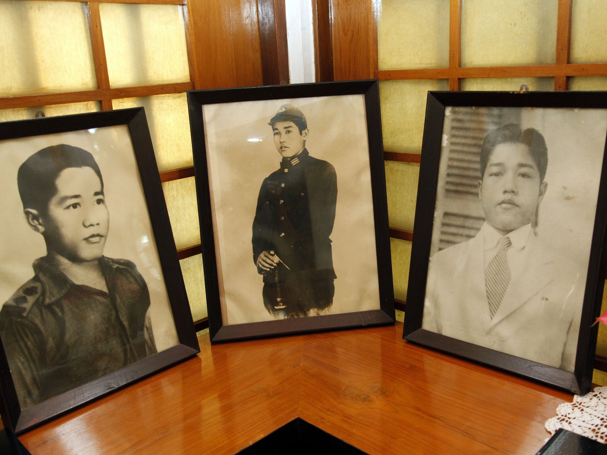 Portraits of Ye Htut at his home in Rangoon. He changed his allies but never his loyalty to Burma