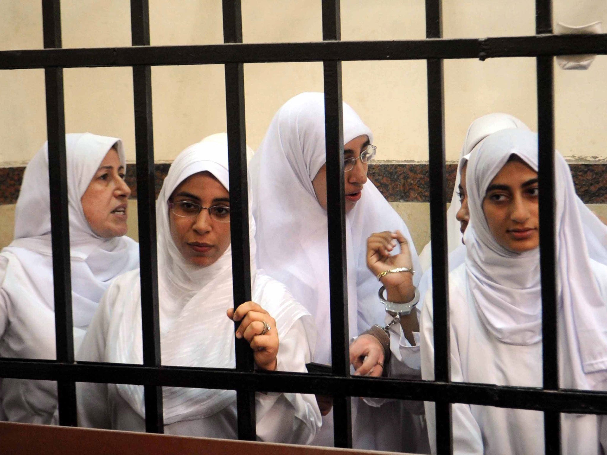 Some of the 21 Islamist women and girls who were arrested for demonstrating in Alexandria. The adults were each jailed for 11 years while the teenagers were sent to children's homes 