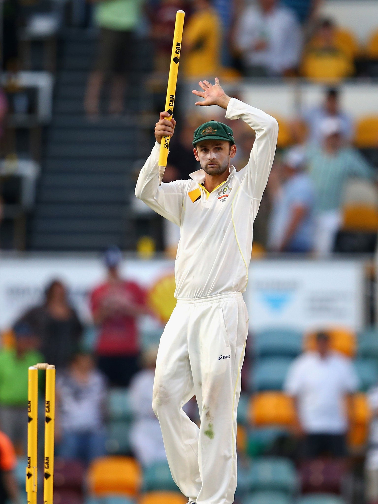 Nathan Lyon claims the spoils of victory at The Gabba