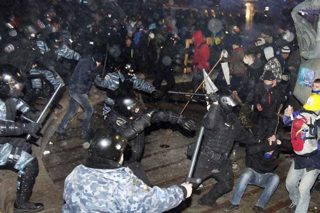 Dozens of protesters were wounded in Ukraine's capital early on Saturday when police brutally dispersed demonstrators