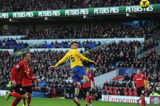 Aaron Ramsey puts Arsenal ahead with a header against Cardiff