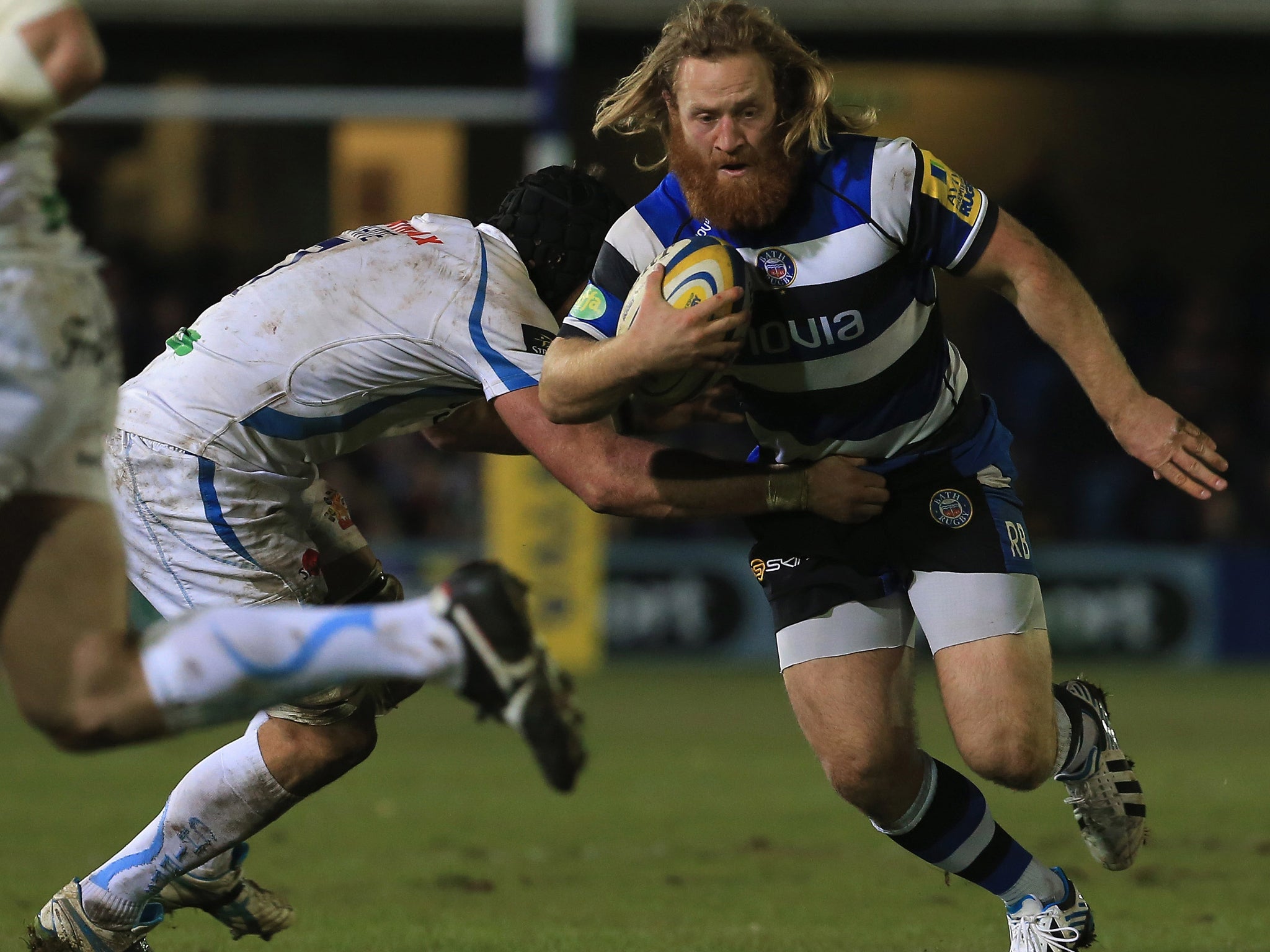 Bath's Ross Batty charges past Exeter's Dean Mumm