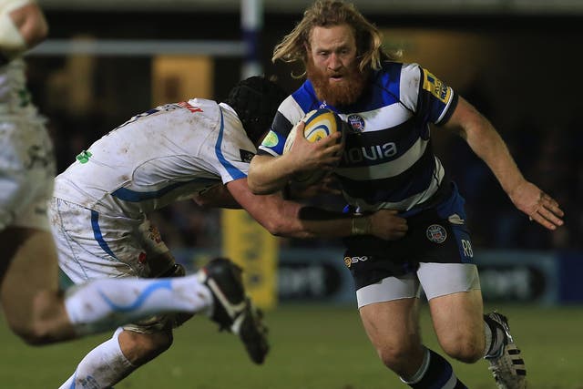 Bath's Ross Batty charges past Exeter's Dean Mumm