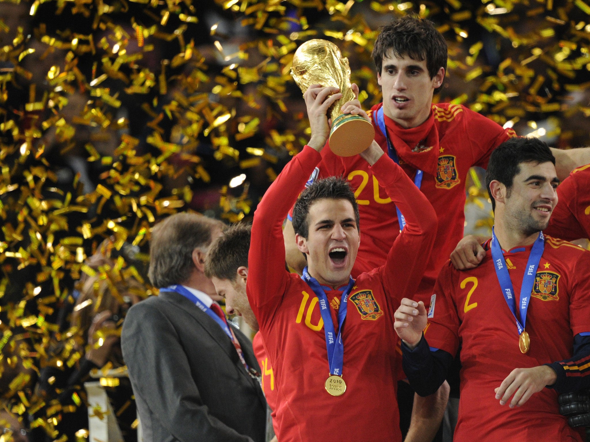 Cesc Fabregas hoists the World Cup aloft after Spain won the tournament in South Africa in 2010