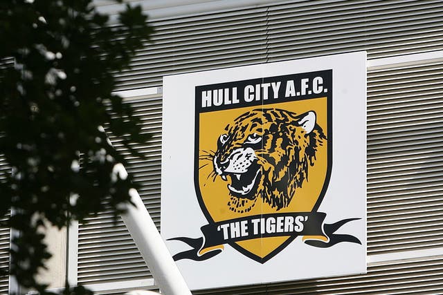 Hull City’s owner has described supporters protesting against his plan to change the name to Hull Tigers as 'hooligans' and warned he will put the club up for sale if the fans do not accept his authority