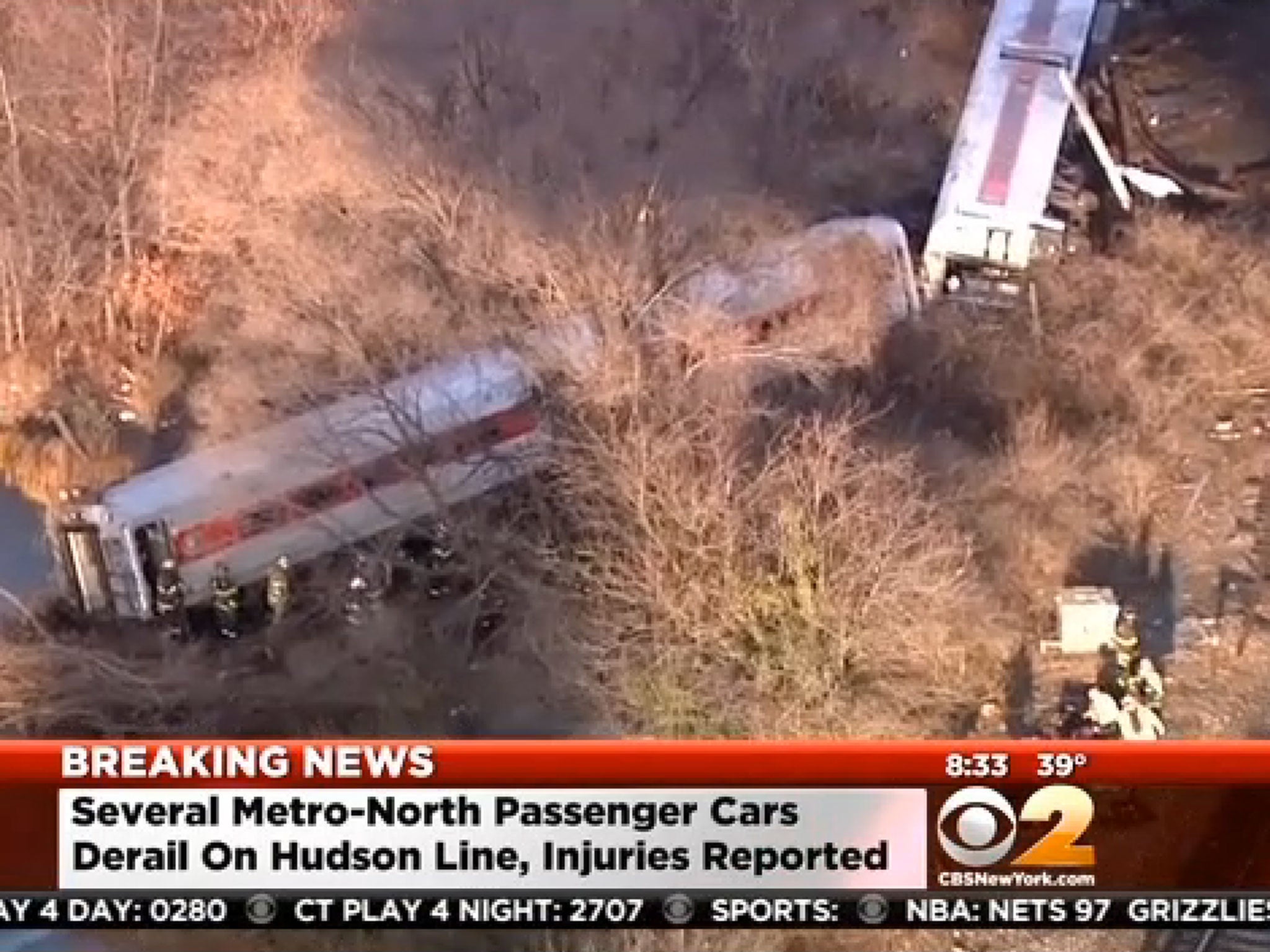 Local media reports show the train derailed on the banks of the Hudson River, with reports of at least two deaths