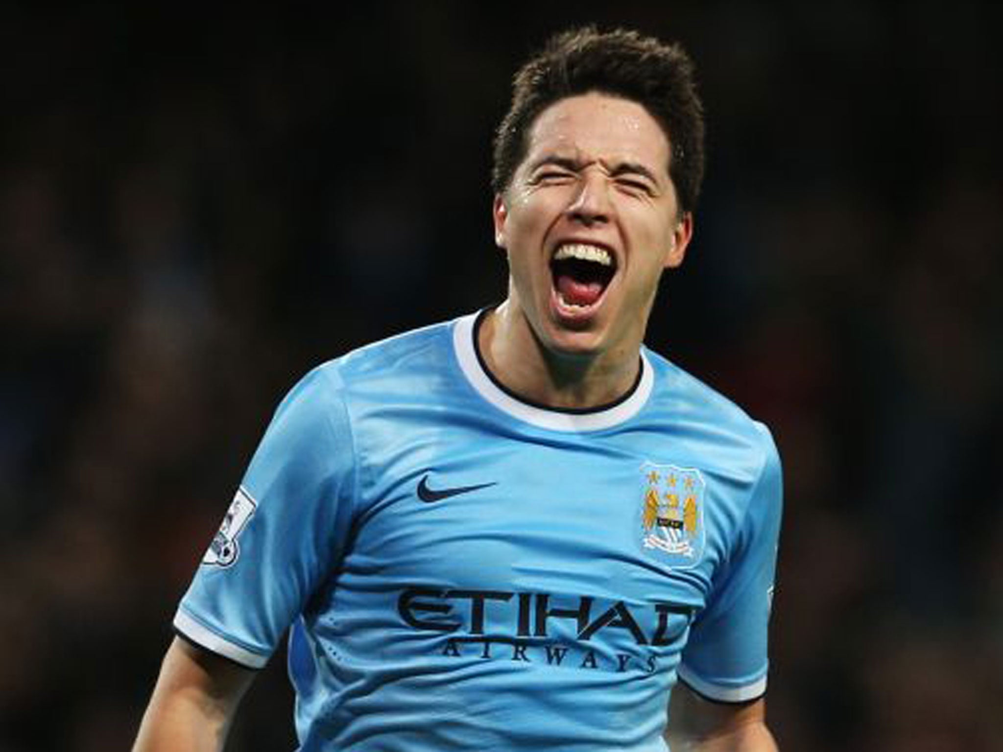 Samir Nasri celebrates his second for Manchester City against Swansea