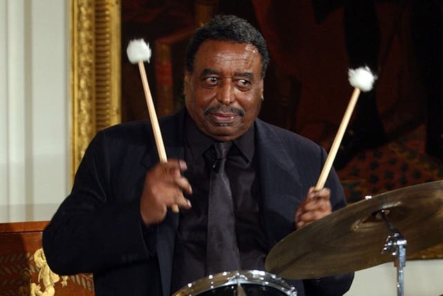 Hamilton performs a drum solo at the White House during a reception to honour Black Music Month in 2004