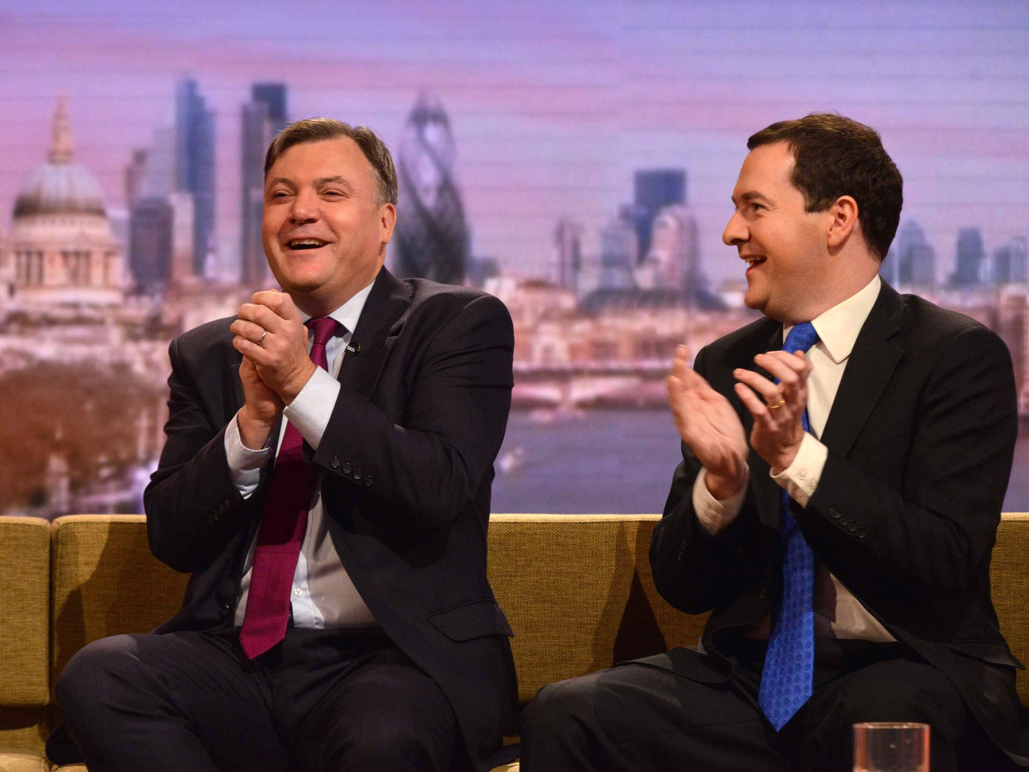 Ed Balls, left, and Chancellor George Osborne, right, share a lighter moment on ‘The Andrew Marr Show’. Warning Mr Osborne not to boast about the recovery, Mr Balls said he would run a budget surplus in the next parliament if Labour wins the election