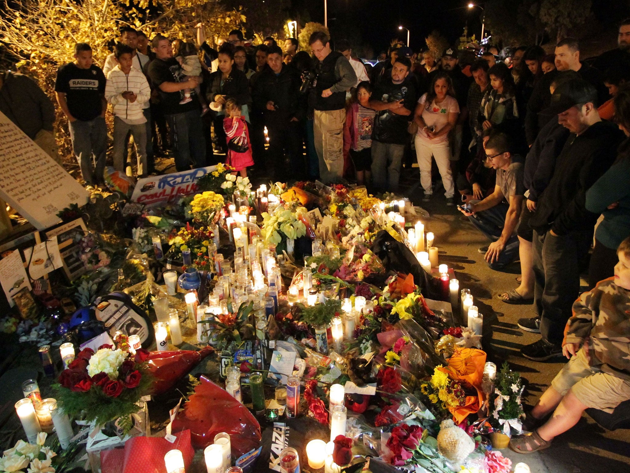 Flowers near the scene of the crash which killed actor Paul Walker and his business partner Roger Rodas