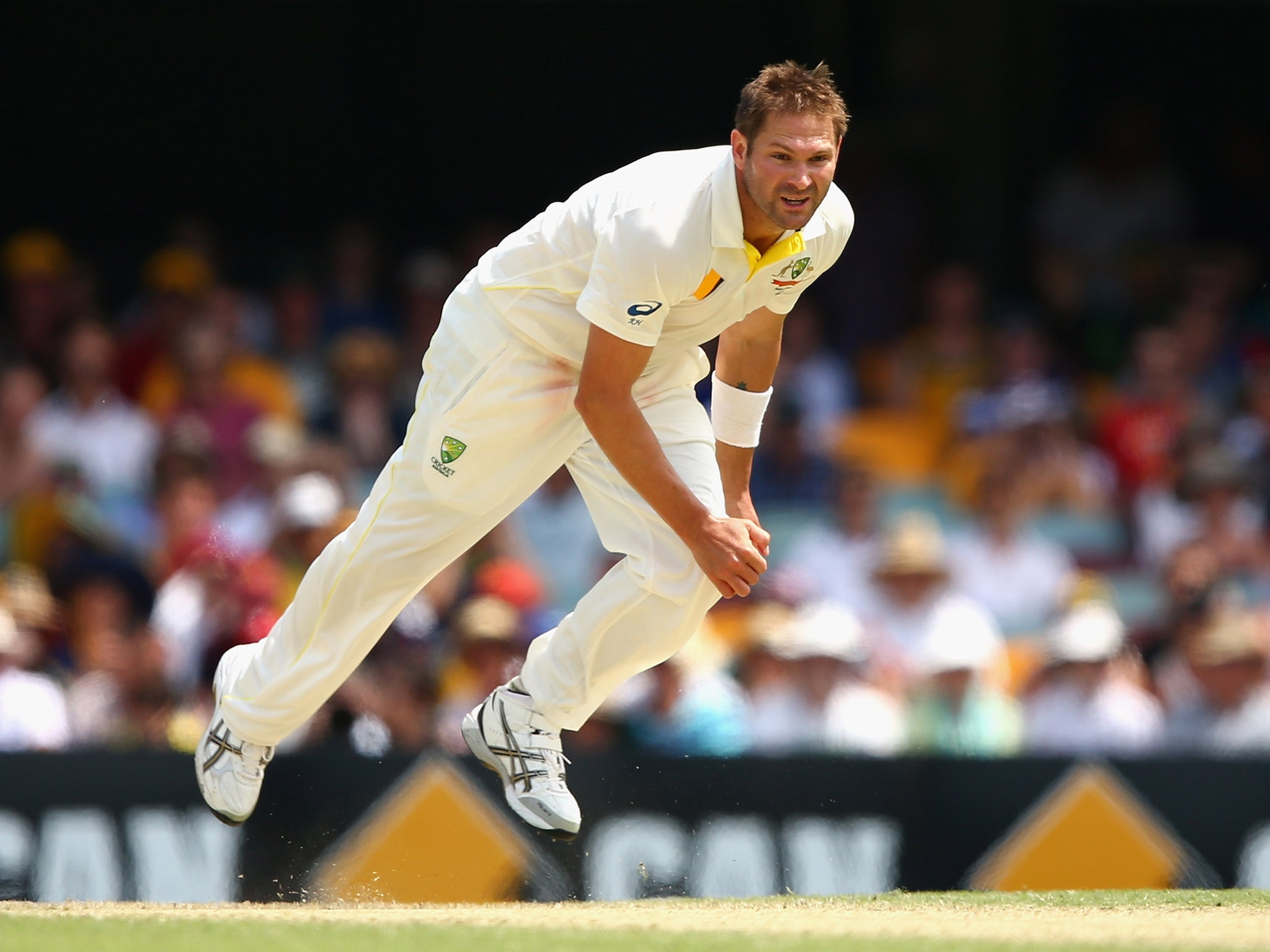 Ryan Harris has promised to come out at Adelaide with 'all guns blazing' as Australia try to take a two-nil lead in the 2013-14 Ashes