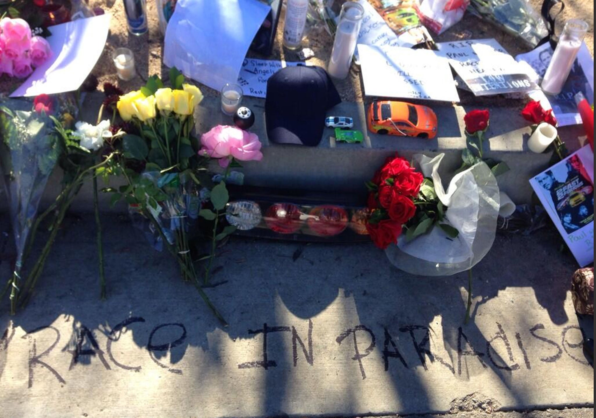 Tributes laid at the scene of the car crash in which actor Paul Walker died