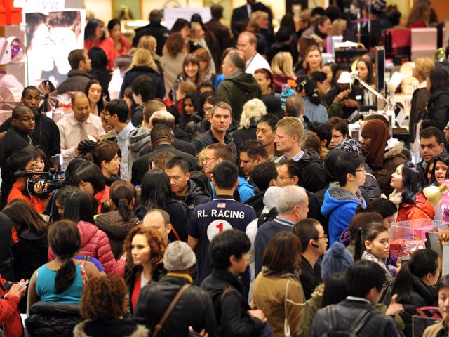 Thanksgiving weekend saw record crowds but spending declined amid heavy discounts