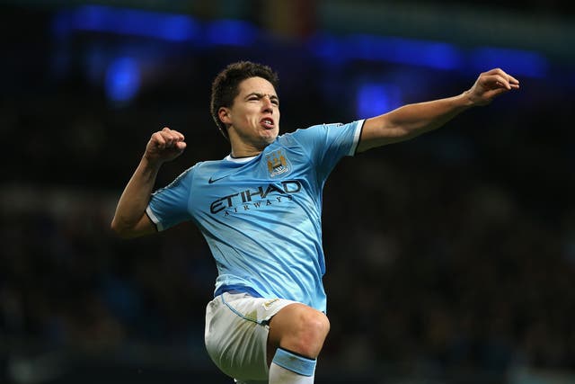 Samir Nasri has challenged Manchester City to demonstrate their brilliant home form on their travels this month to take them to the top of the Premier League