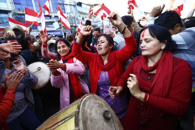 Supporters of Nepali Congress Party cheer for their party at the Constituent Assembly Elections 