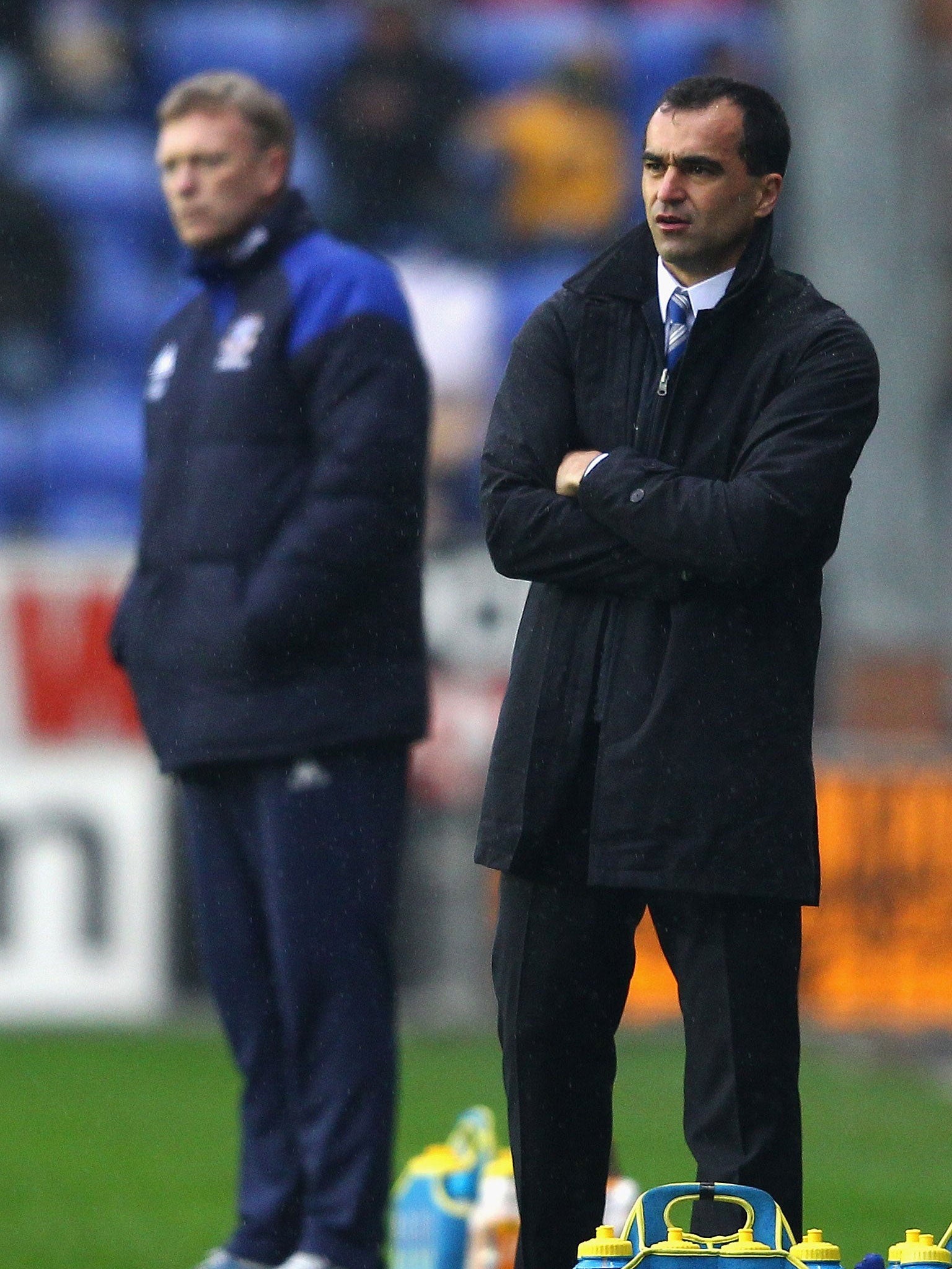 Roberto Martinez, then at Wigan (right), alongside David Moyes, then Everton manager