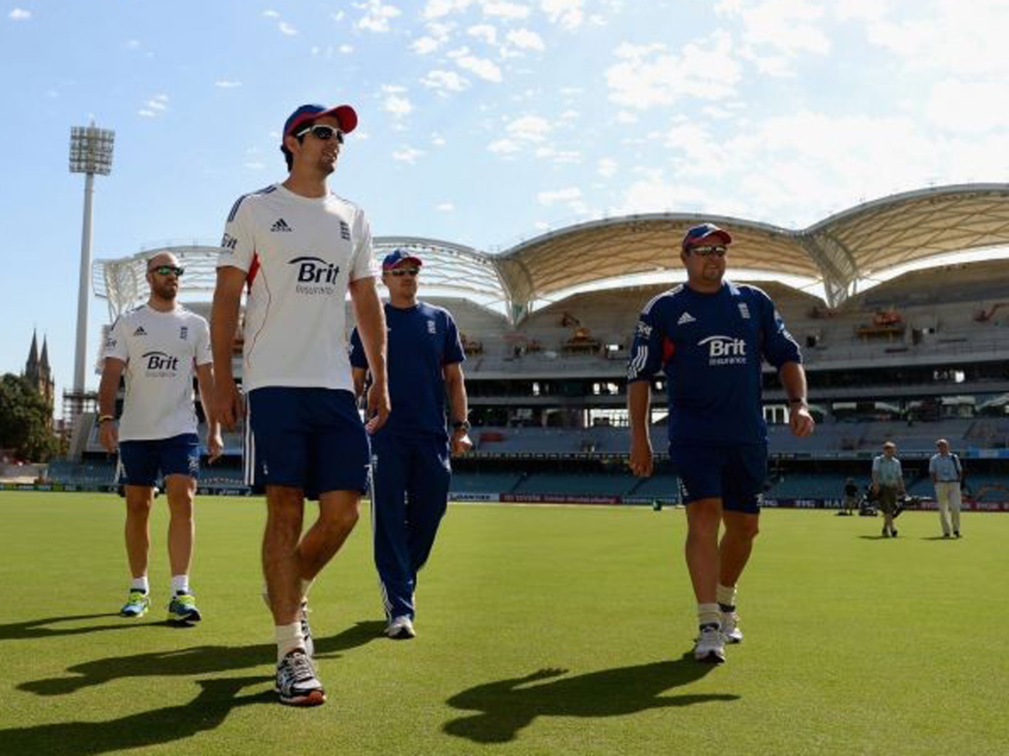 Cook arrives alongside Matt Prior, coach Andy Flower and bowling coach David Saker for a nets session in Australia