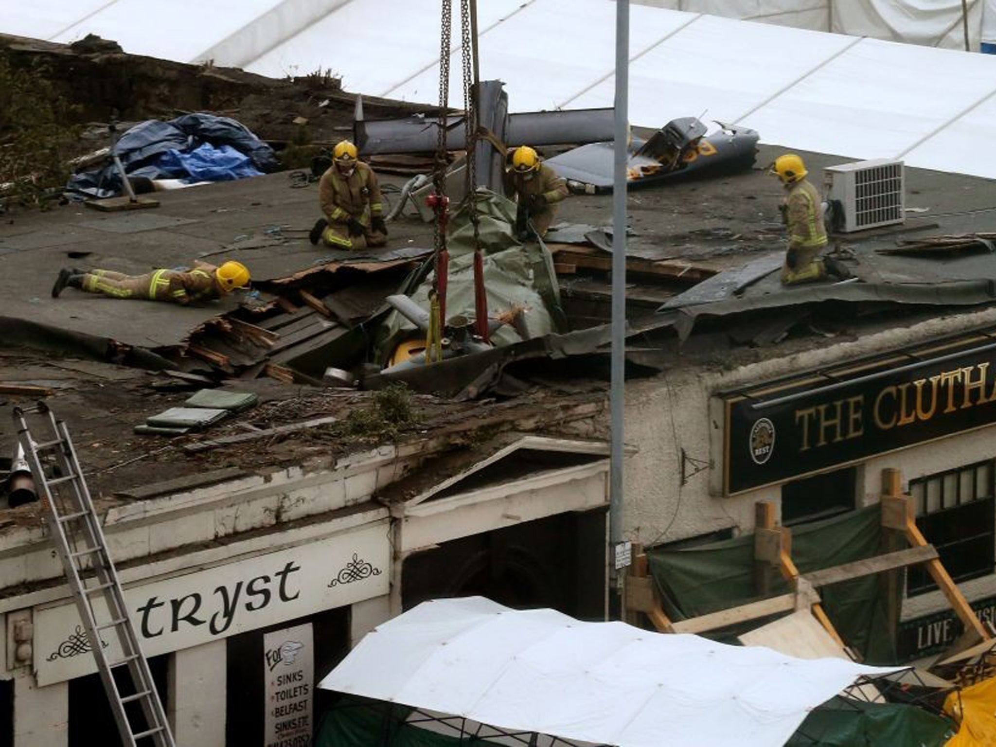 The wreckage of the police three-tonne Eurocopter before being lifted from the Clutha Vaults in Glasgow