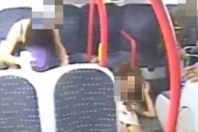 CCTV footage shows the woman unconscious on the floor of the bus
